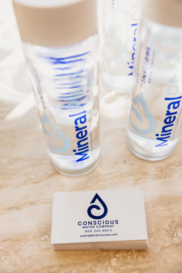Conscious Water Company glass mineral water bottles